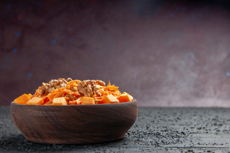 front-view-fresh-carrot-salad-grated-salad-with-walnuts-garlic-dark-desk-diet-salad-color-nut-health